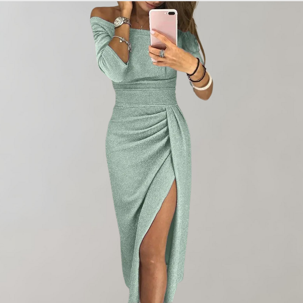 Elegantes grünes Kleid mit asymmetrischem Schnitt und Schulterfrei-Design, ideal für Abendmode. Perfekt für stilvolle Anlässe und Partys.