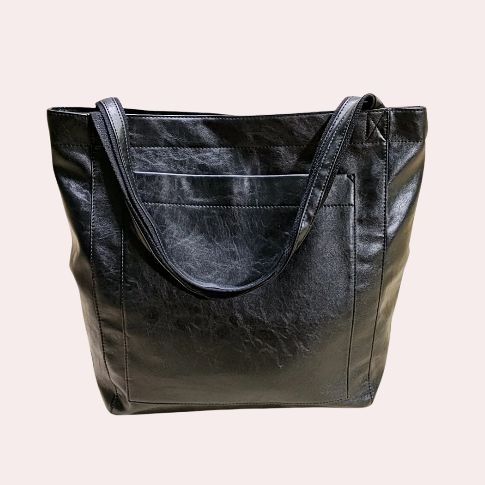 Schwarze Ledertasche mit geräumigem Hauptfach und robusten Trägern. Elegantes Design, ideal für Alltag und Büro. Hochwertige Verarbeitung.