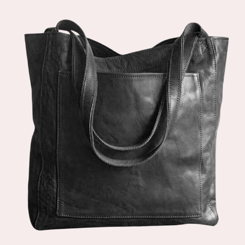 Schwarze Ledertasche mit doppelten Trägern, geräumigem Hauptfach und elegantem Design. Perfekt für Alltag und Büro. Hochwertige Handtasche.