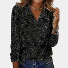 Schwarze Paillettenbluse mit V-Ausschnitt, langärmlig, ideal für elegante Abendmode. Glitzerndes Design, perfekt für Partys und festliche Anlässe.