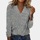 Silberner Paillettenpullover für Damen, V-Ausschnitt, langärmlig, modisch, ideal für Partys und festliche Anlässe. Glitzerndes Design.