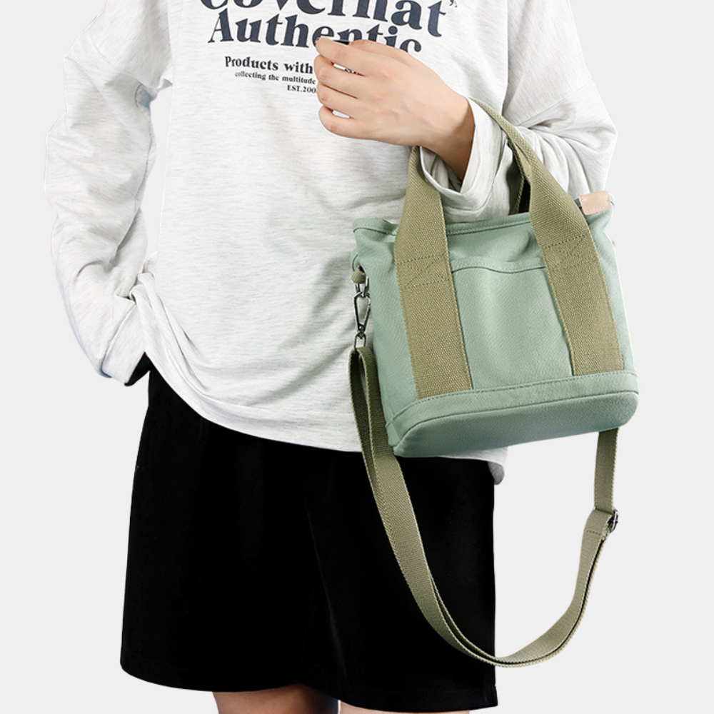 Grüne Umhängetasche aus Leder mit verstellbarem Riemen, ideal für Damenmode. Stilvoll, praktisch und perfekt für den täglichen Gebrauch.
