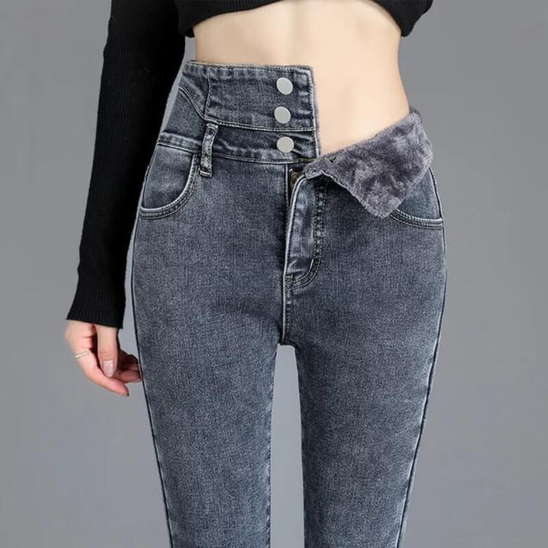 Damenjeans mit hoher Taille, asymmetrischem Knopfverschluss und grauem Denim. Modische, bequeme Passform für trendige Outfits.