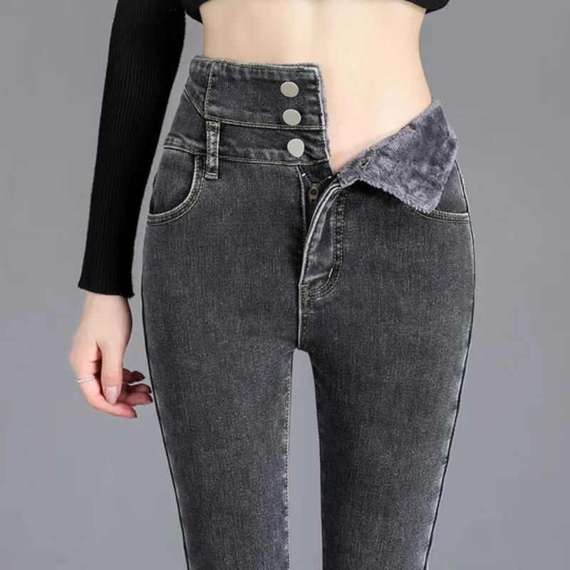 Damenjeans mit hoher Taille, graue Waschung, asymmetrischer Knopfverschluss, modisch, bequem, ideal für Herbst- und Winteroutfits.