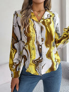 Elegantes Damenhemd mit Batikmuster, Herbst, Puffärmel, langärmelig, in Gelb und Weiß. Modische Bluse für Freizeit und Büro.