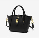 Elegante schwarze Handtasche aus Leder mit goldenen Beschlägen und abnehmbarem Schulterriemen. Perfekt für stilvolle Damenmode.