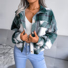 Damenmode Herbst Winter: Kariertes Wolljacke mit Laternenärmeln, einreihig, locker geschnitten. Perfekt für stilvolle, lässige Outfits.