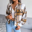 Damenmode Herbst Winter: Kariertes Wolljacke mit Laternenärmeln, Einreihig, Lässig. Perfekt für stilvolle, warme Outfits.