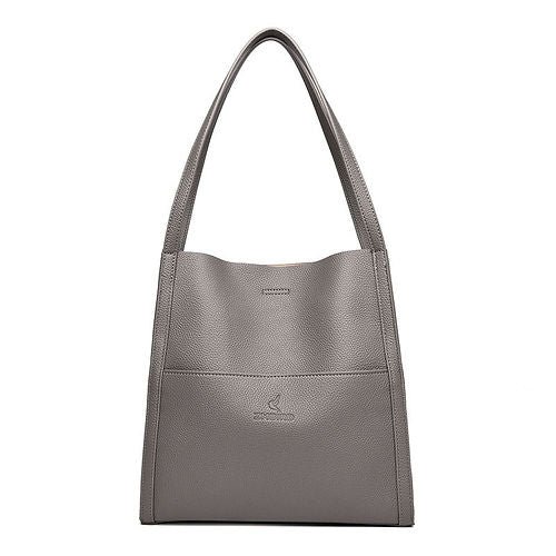 Elegante graue Ledertasche, minimalistisch und stilvoll, ideal für Damen. Perfekt für Alltag und Büro. Hochwertige Verarbeitung, zeitloses Design.