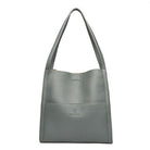 Elegante grüne Ledertasche mit Schulterriemen, ideal für Damen. Hochwertiges Design, perfekt für Alltag und Büro. Modische Handtasche kaufen.