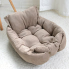 Beiges Hundebett aus Stoff, gemütlich und gepolstert, ideal für kleine Haustiere.
