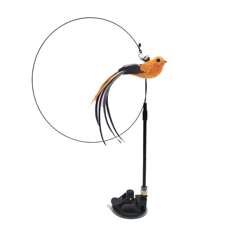 Spielzeugvogel mit langem Schwanz auf schwarzem Ständer, interaktives Katzenspielzeug.