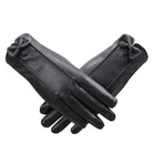 Schwarze Lederhandschuhe mit Schleifendetail, elegant und stilvoll, ideal für Damenmode, Winteraccessoires, hochwertige Materialien.