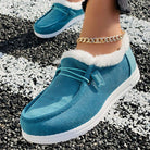 Damen-Winter-Sneaker in Türkis mit Plüschfutter, rutschfester Sohle und Schnürung. Bequem, warm und stilvoll für kalte Tage.