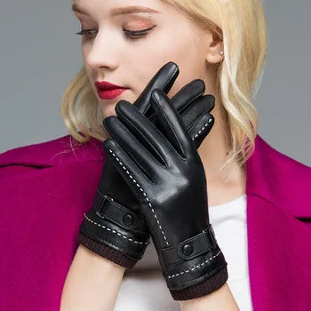 Elegante schwarze Lederhandschuhe für Damen, stilvoll und warm, ideal für Herbst und Winter. Perfekt für modische Outfits und kalte Tage.
