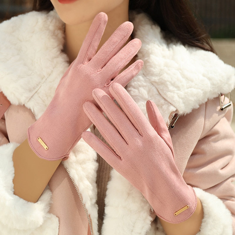 Damenhandschuhe aus rosa Wildleder, elegant und warm, ideal für Wintermode. Perfekt für stilvolle Outfits und kalte Tage. Hochwertige Verarbeitung.