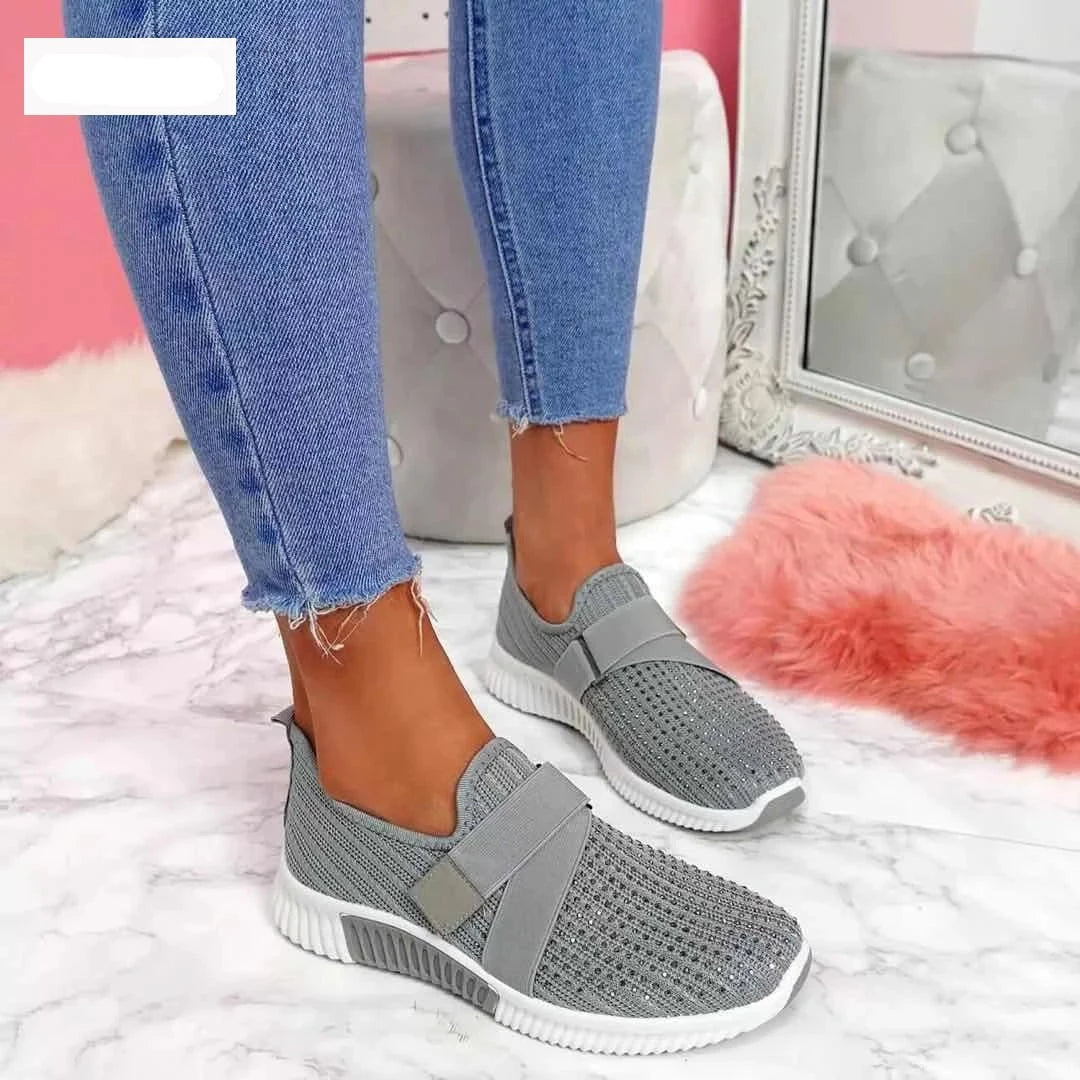 Graue Damen-Sneaker aus Strickstoff, bequem, modisch, ideal für Freizeitkleidung.