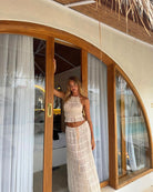 Elegantes Sommerkleid für Damen, ärmellos und bodenlang, ideal für Strandurlaube. Perfekt für stilvolle Sommermode und entspannte Tage.