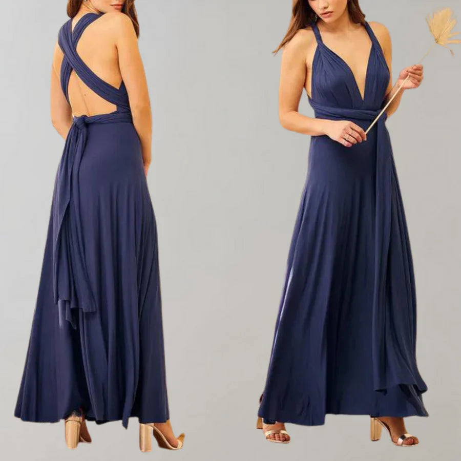 Elegantes blaues Abendkleid mit tiefem V-Ausschnitt und überkreuztem Rücken. Perfekt für formelle Anlässe. Hochwertige Damenmode.