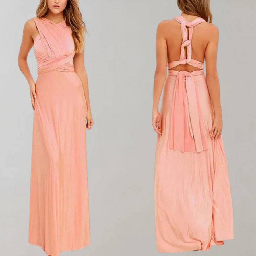 Elegantes langes Abendkleid in Rosa mit Wickeldesign und offenem Rücken. Perfekt für Hochzeiten, Partys und formelle Anlässe.