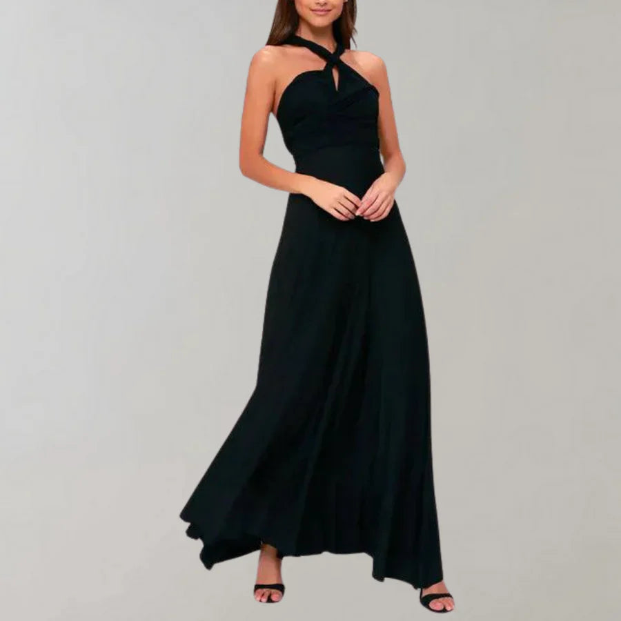 Elegantes schwarzes Abendkleid mit Neckholder, bodenlang und fließend. Perfekt für formelle Anlässe und stilvolle Auftritte.