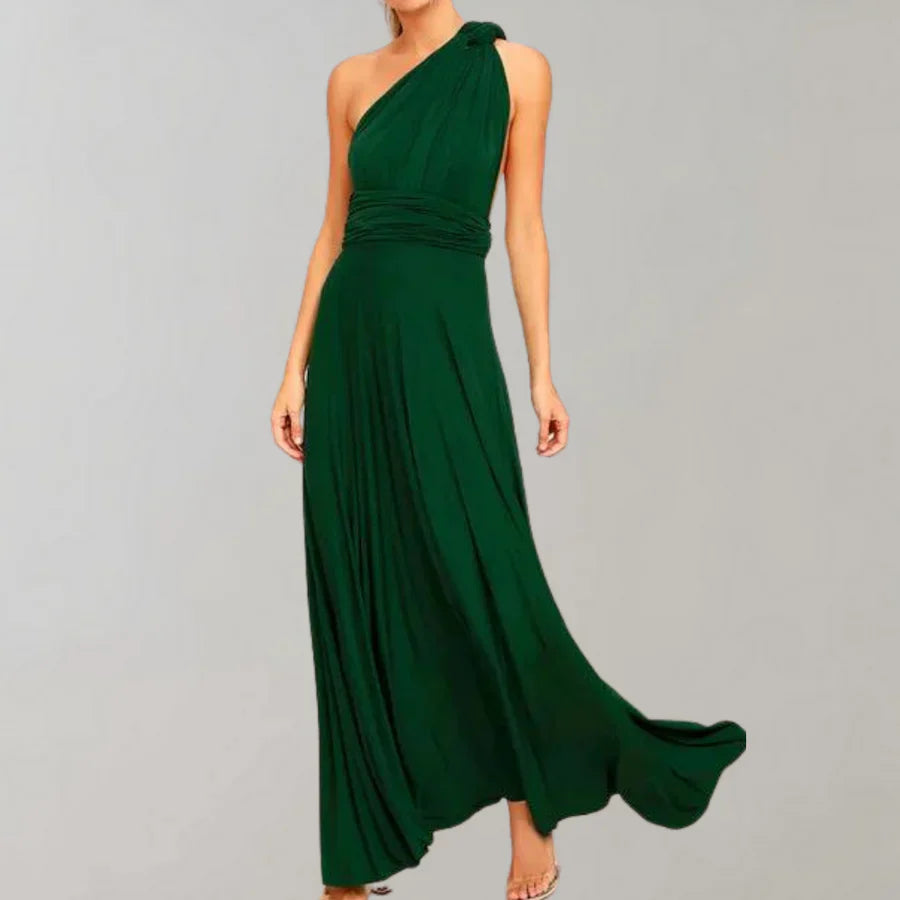 Elegantes, grünes, schulterfreies Abendkleid aus fließendem Stoff, ideal für formelle Anlässe. Perfekt für stilvolle Auftritte und besondere Events.