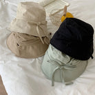 Koreanischer Fischerhut für Damen, leicht und winddicht, mit Schnürung. Perfekt als Sonnenschutz. Erhältlich in Beige, Schwarz und Grau.
