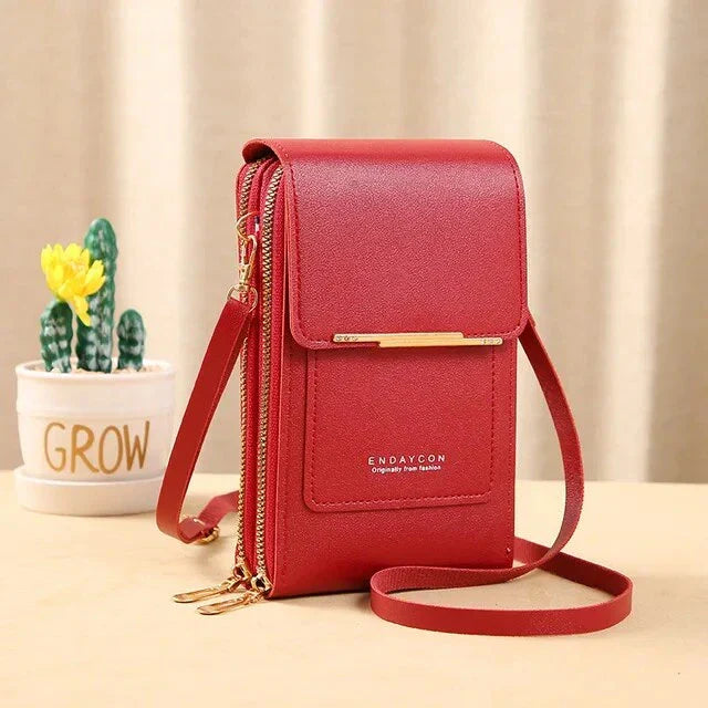 Rote Damen-Umhängetasche aus Leder mit Reißverschluss, elegant und modern.