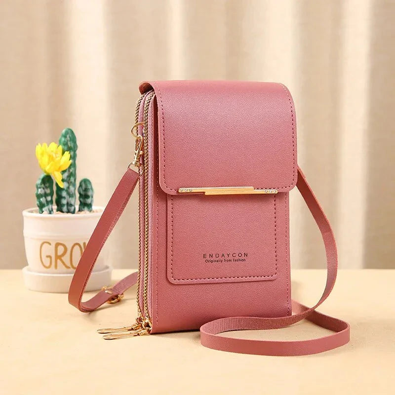Rosa Damen-Umhängetasche aus Leder mit Reißverschluss, modisch und elegant.