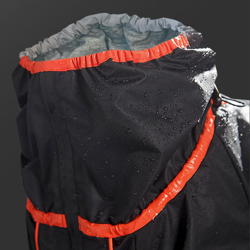 Wasserdichte Hundejacke, schwarz mit roten Akzenten, ideal für große Hunde. Verstellbar, robust, schützt vor Regen und Wind. Perfekt für Outdoor-Abenteuer.