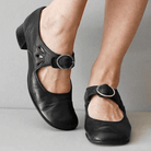 Schwarze Mary Jane Schuhe mit Schnalle, elegantes Design, ideal für Damenmode. Bequem und stilvoll, perfekt für Alltag und besondere Anlässe.