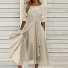Elegantes Damenkleid in Grün, A-Linie, mit Spitze und halbem Ärmel. Perfekt für Partys und Galas. Hochwertige Abendmode für Frauen.