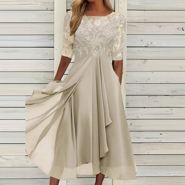Elegantes Damenkleid in Grün, A-Linie, mit Spitze und halbem Ärmel. Perfekt für Partys und Galas. Hochwertige Abendmode für Frauen.