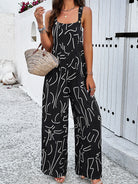 Damen Jumpsuit mit abstraktem Muster, ärmellos, schwarz-weiß, ideal für Sommermode, lässiger Stil, perfekt für Strand und Freizeit.
