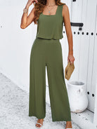 Damen Jumpsuit in Olivgrün, ärmellos, mit weitem Bein und quadratischem Ausschnitt. Perfekt für Sommermode, elegant und lässig zugleich.