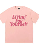 Rosa T-Shirt mit Aufdruck "Living For Yourself", aus Baumwolle, Unisex-Design, modisch, bequem, ideal für Freizeitkleidung und Streetwear.