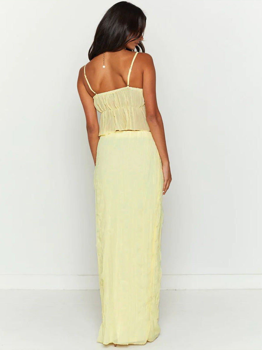 Damen-Sommerkleid in Pastellgelb, ärmellos mit Spaghettiträgern, bodenlang. Perfekt für Strandmode und lässige Sommeroutfits.
