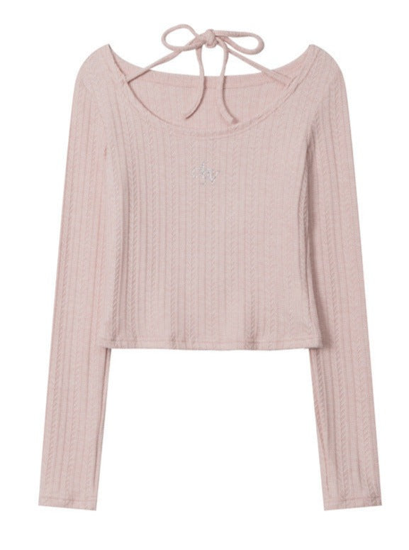 Damenpullover in Rosa, langärmelig, mit Rundhalsausschnitt und Schleifendetail. Modischer Strickpullover, ideal für Herbst und Winter.