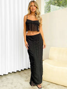 Elegantes schwarzes Maxikleid für Damen, ärmellos mit Rüschen, ideal für Sommermode und Abendveranstaltungen. Trendiges Design, bequem und stilvoll.