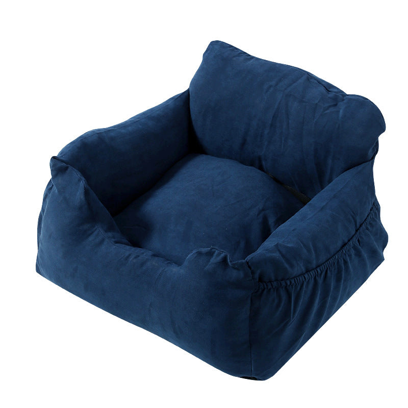 Blaues Hundebett aus weichem Stoff, quadratisch, gemütlich, ideal für kleine Haustiere.
