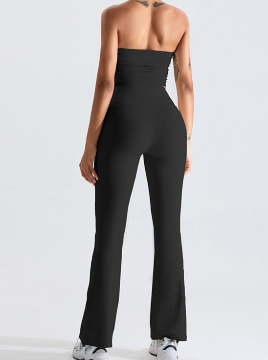 Damen Jumpsuit schwarz, schulterfrei, figurbetont, elegant, modisch, ideal für Partys, aus hochwertigem Material, bequem und stilvoll.
