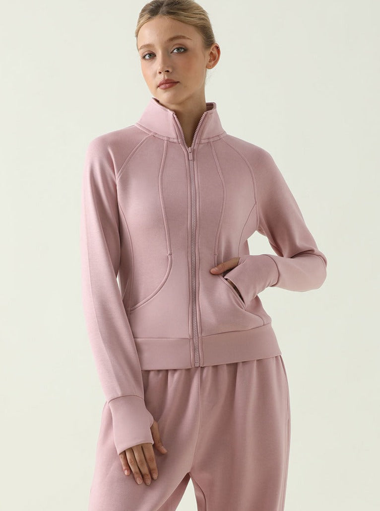Damen-Sportjacke in Rosa mit Reißverschluss, ideal für Fitness und Freizeit. Bequeme Passform, atmungsaktives Material, modischer Look.