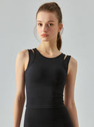 Damen-Sporttop in Schwarz, ärmellos, atmungsaktiv, ideal für Fitness und Yoga. Hochwertiges Material, figurbetont, modisch und bequem.