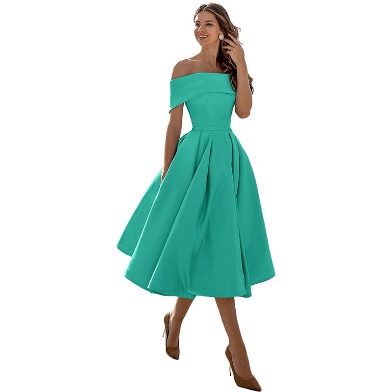 Elegantes, schulterfreies, smaragdgrünes Kleid für Damen, knielang, ideal für Abendveranstaltungen, Hochzeiten und Partys. Zeitloser Chic und Stil.
