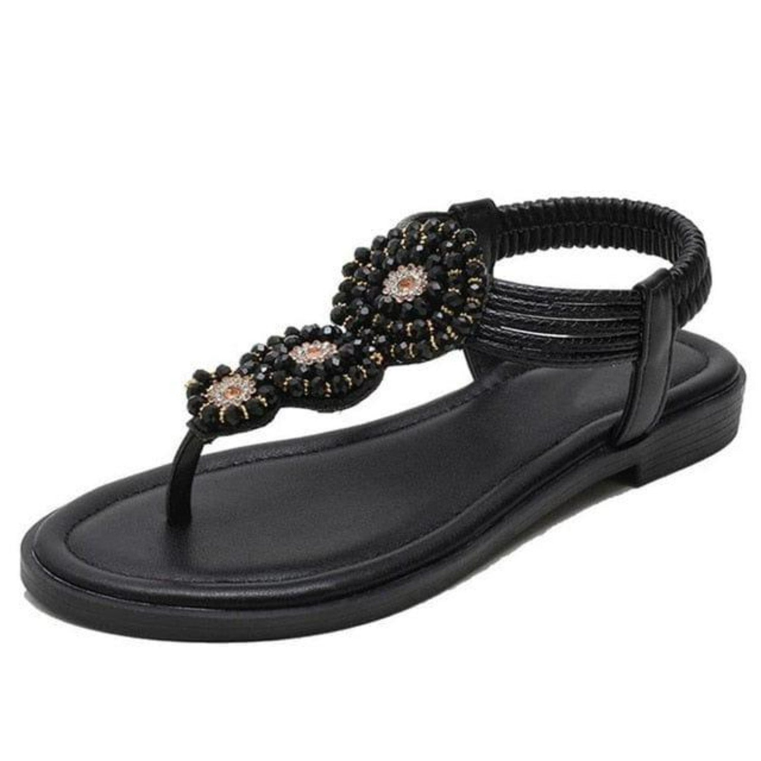 Elegante schwarze Sandale mit Perlenverzierung, ideal für Sommermode. Bequeme Passform, modisches Design, perfekt für Damen-Outfits.