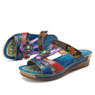 Bunte Damen-Sandalen mit Blumenmuster, Keilabsatz und Lederoptik. Perfekt für Sommermode, bequem und stilvoll. Ideal für Freizeit und Urlaub.