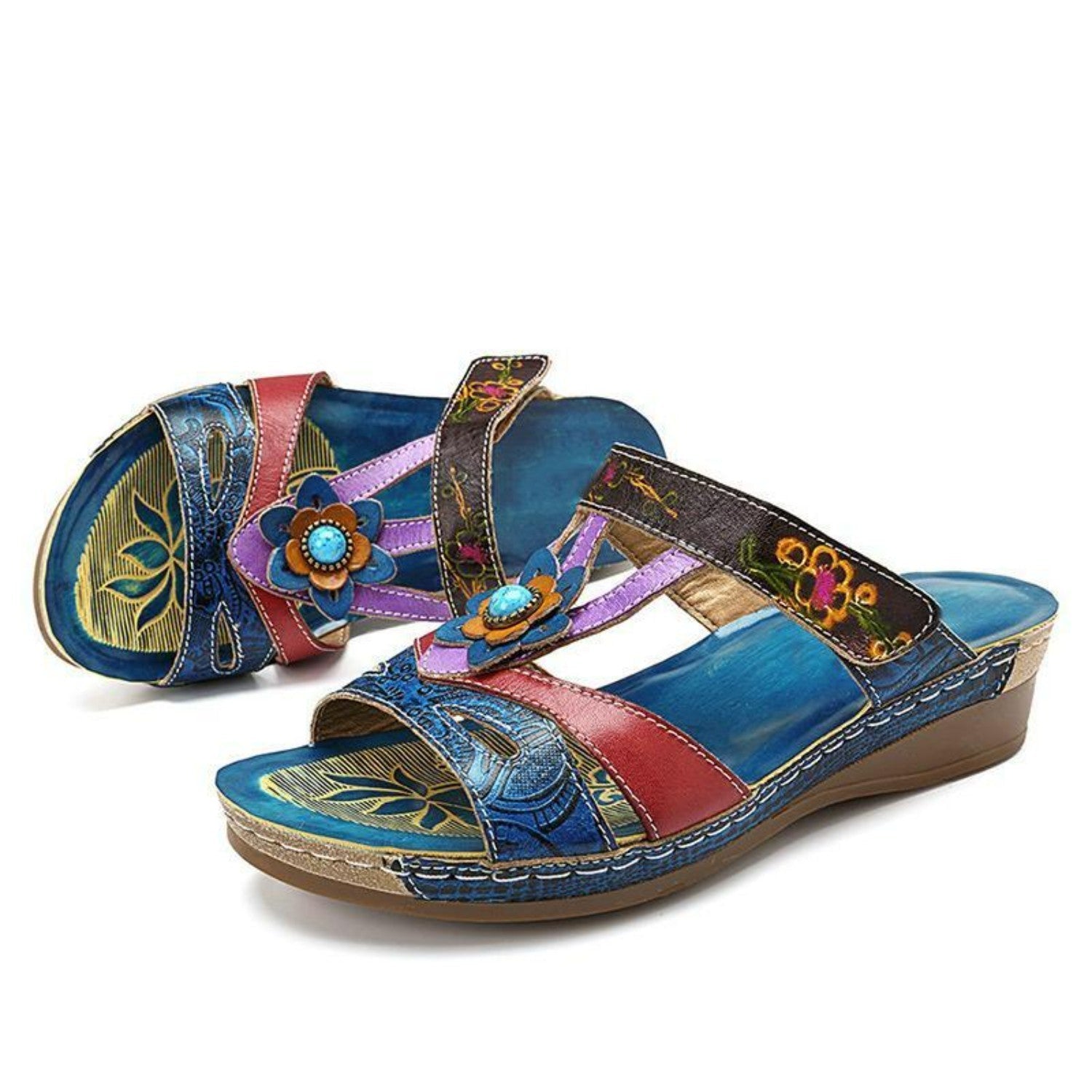 Bunte Damen-Sandalen mit Blumenmuster, Keilabsatz und Lederoptik. Perfekt für Sommermode, bequem und stilvoll. Ideal für Freizeit und Urlaub.