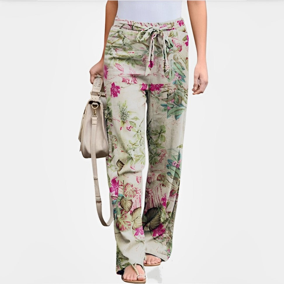 Damenhose mit floralem Muster, lockerem Schnitt und Kordelzug. Perfekt für Sommermode, Freizeitkleidung und bequeme Outfits.