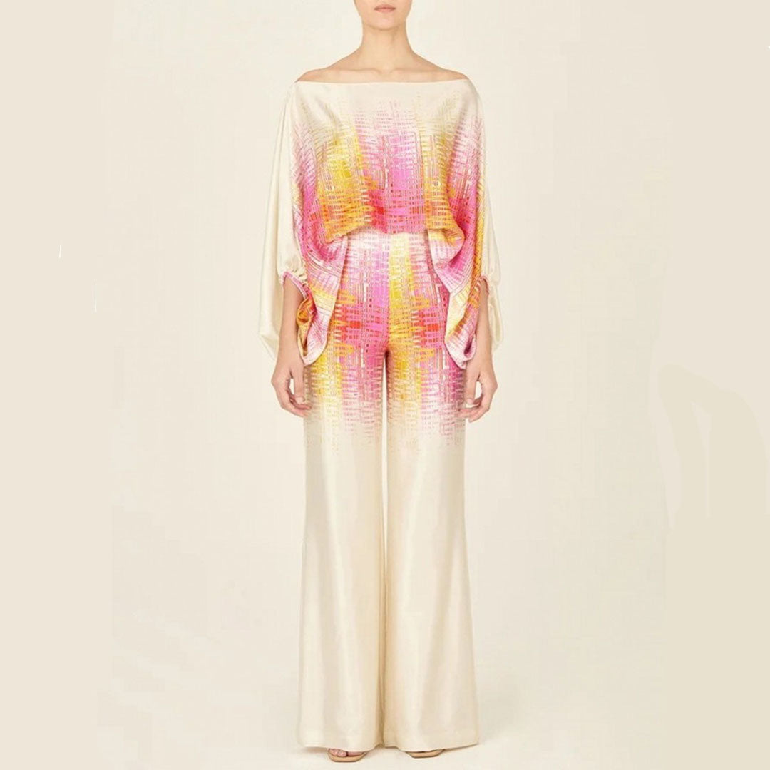Eleganter Damen-Jumpsuit, cremefarben mit pink-gelbem Muster, schulterfrei, Abendmode.