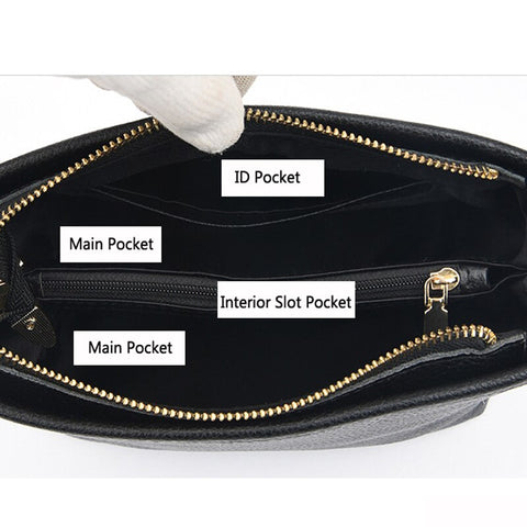 Schwarze Lederhandtasche mit Reißverschluss, Hauptfach, ID-Fach und Innensteckfach. Stilvoll, praktisch, ideal für Damenmode.
